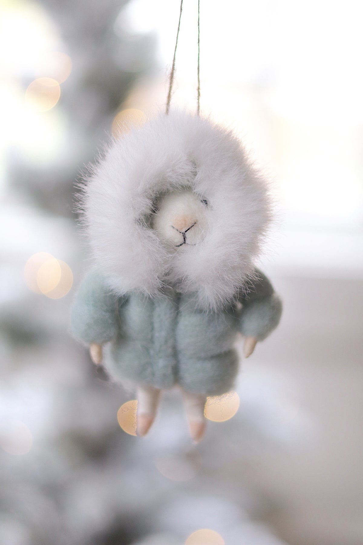lifestyle view of parka paulette Outdoor Holiday Mouse Ornament - 10 Options at Maison garçonne
