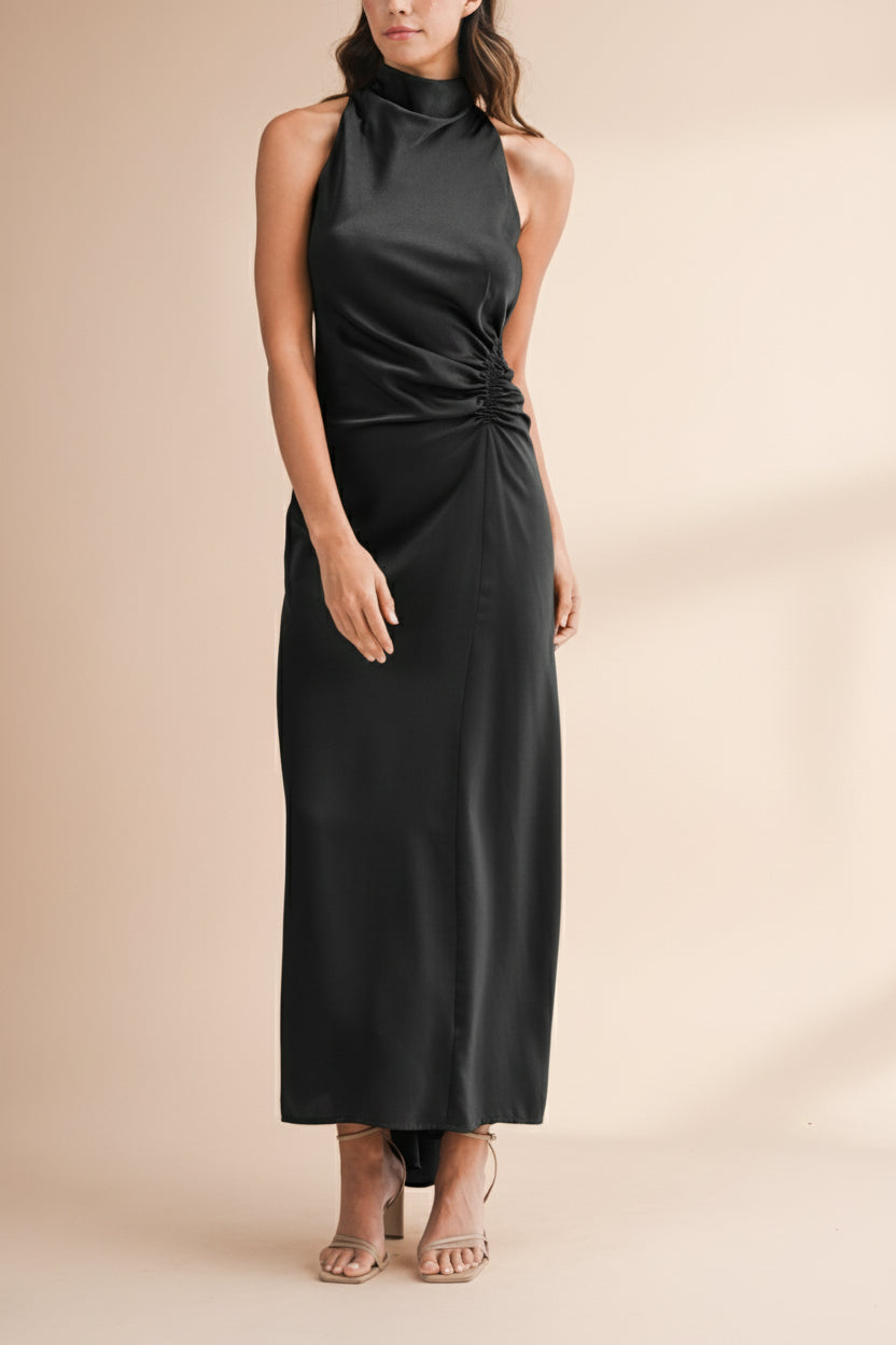 Front view of a woman wearing the Alberta Black Maxi Dress with a high neckline from Boutique 1861.