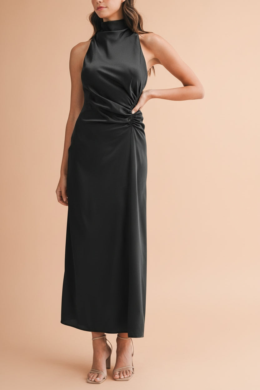 Front view of a woman wearing the Alberta Black Maxi Dress with a high neckline from Boutique 1861.