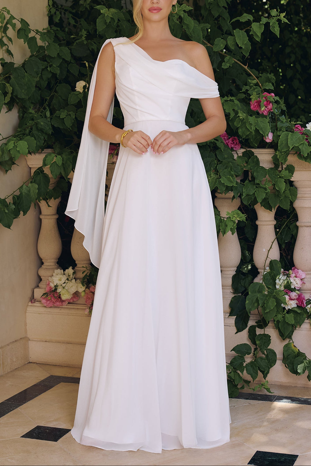 Woman wearing Alexandra, a white one-shoulder dress from Boudoir 1861