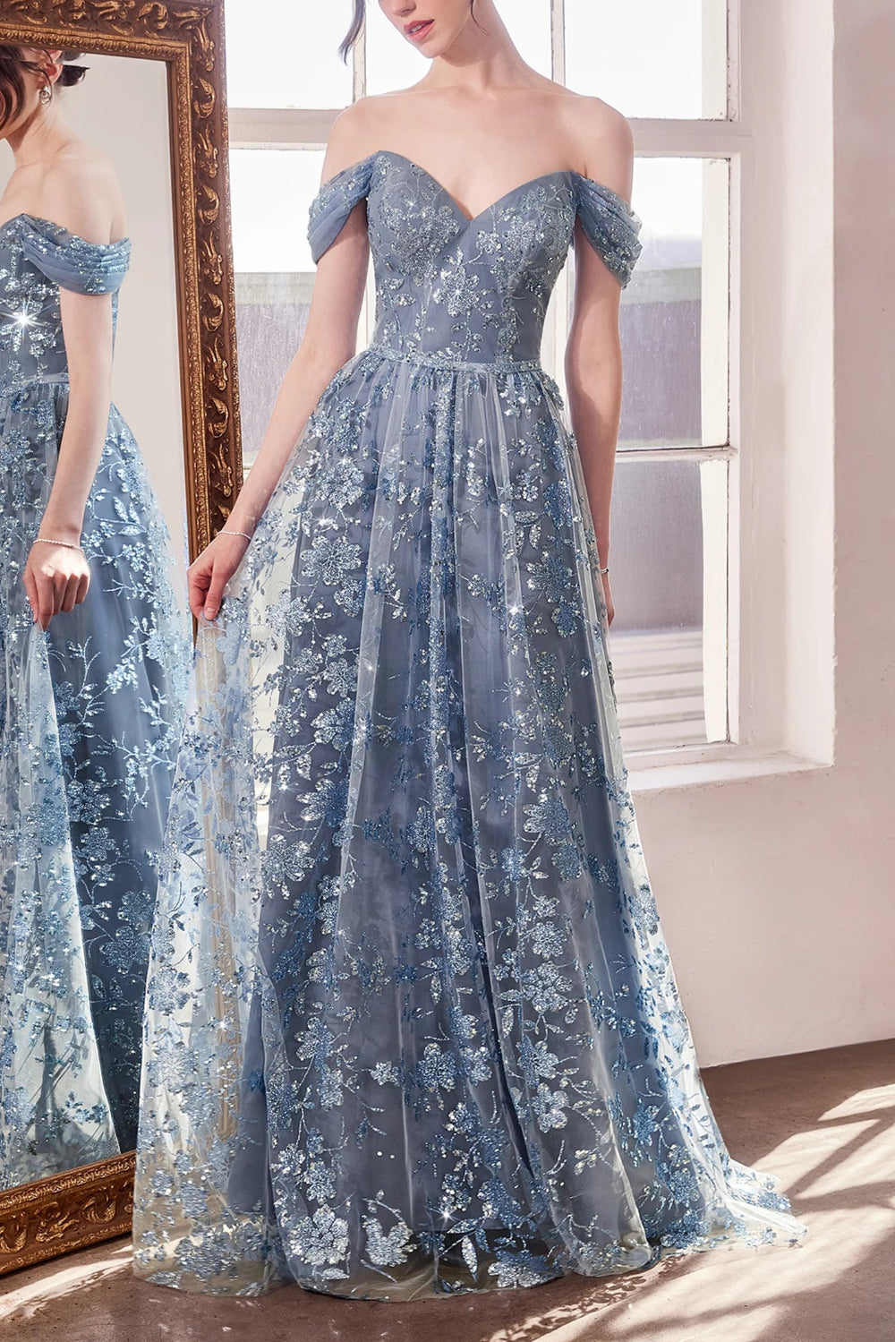 front view of women wearing Alienor Blue Grey Glittery Off the Shoulder Maxi Dress from Boutique 1861