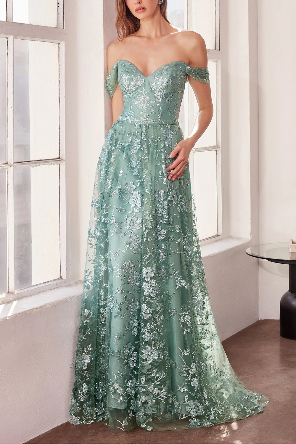 women wearing Alienor Teal Glittery Off the Shoulder Maxi Dress from Boutique 1861