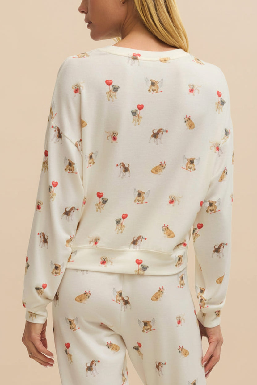 back of a woman wearing Almora White Long Sleeves Top with Dog Print from La petite garçonne
