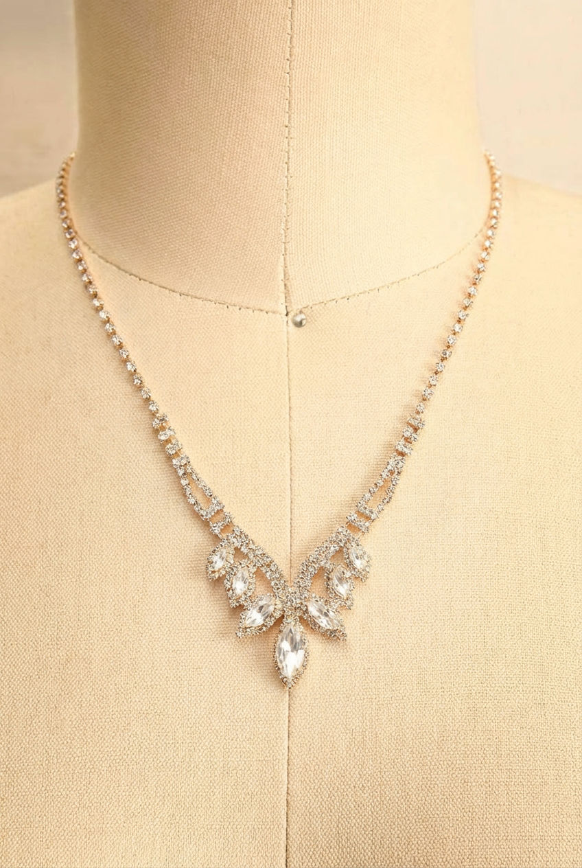 Close-up a gold gemstone necklace called Artee from boutique 1861.