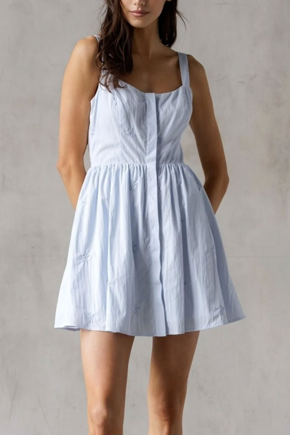 Allegra Short Blue Dress with Bow Embroidery | Boutique 1861 frontview on model