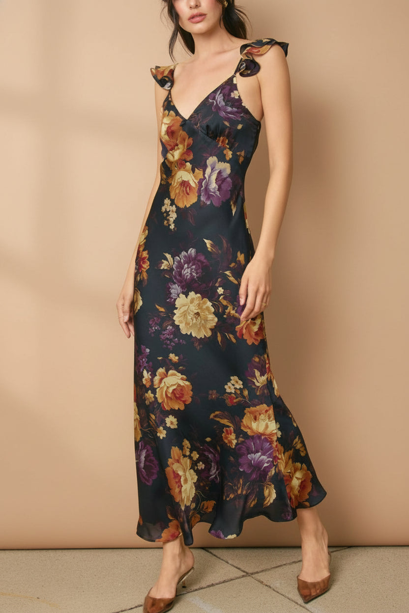 Front view of a woman wearing the Angella Floral Satin Dress from Boutique 1861
