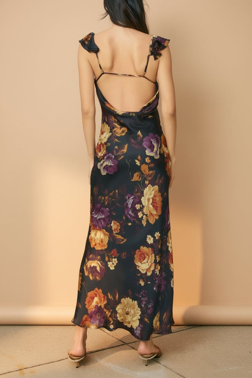 Back view of a woman wearing the Angella Floral Satin Dress from Boutique 1861