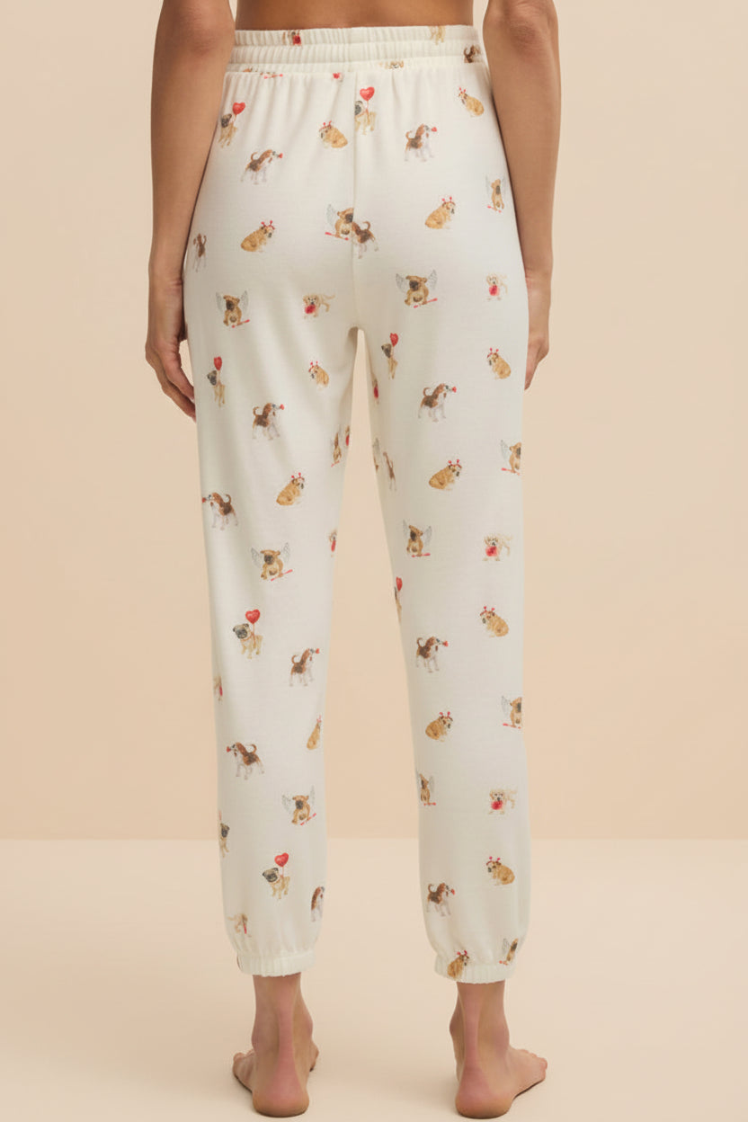 back of a woman wearing Ballari White Jogger Pants with Dog Print from La petite garçonne