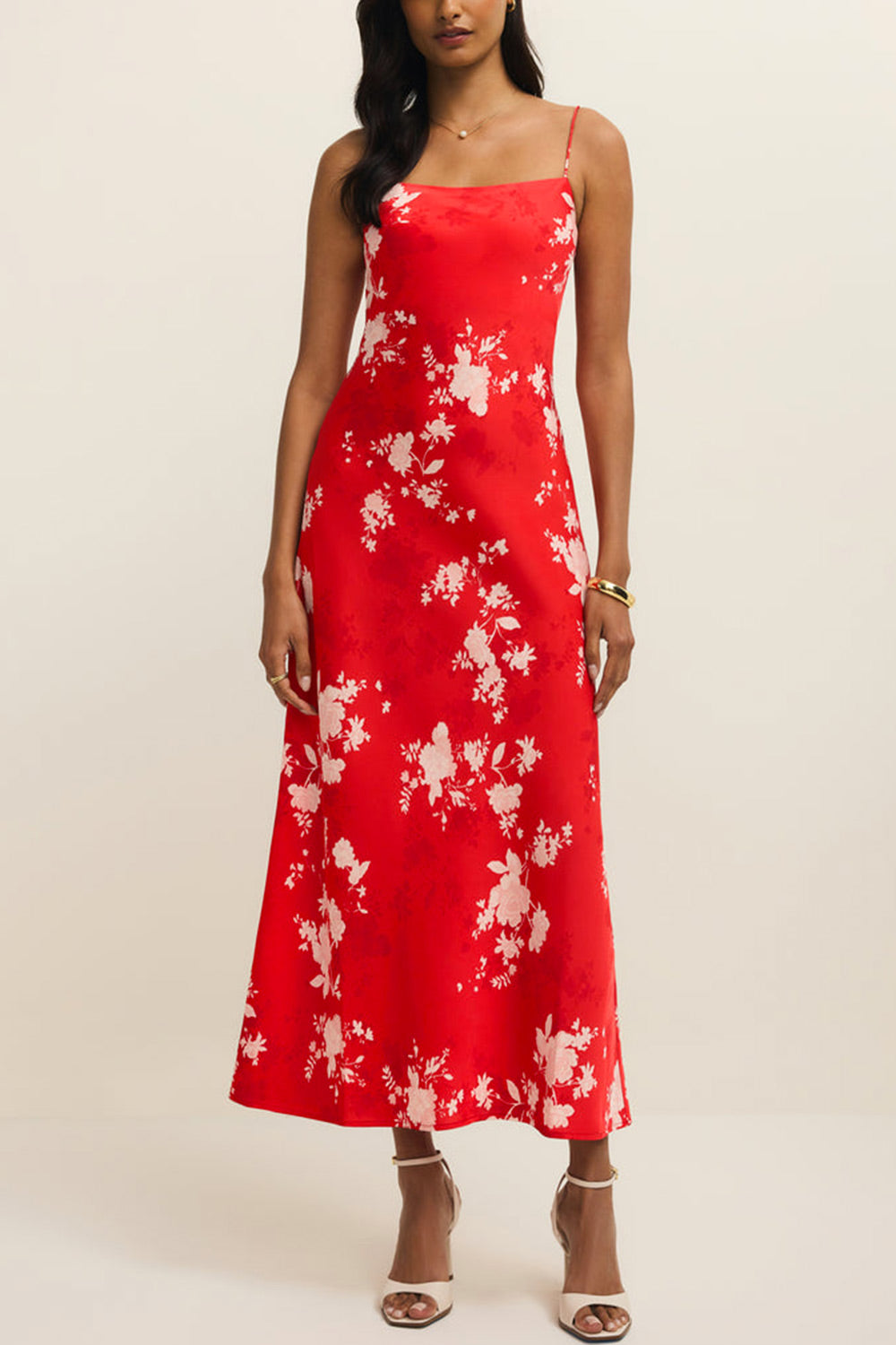 front of a woman wearing Bobbi Red Floral Fitted Midi Dress from Boutique 1861