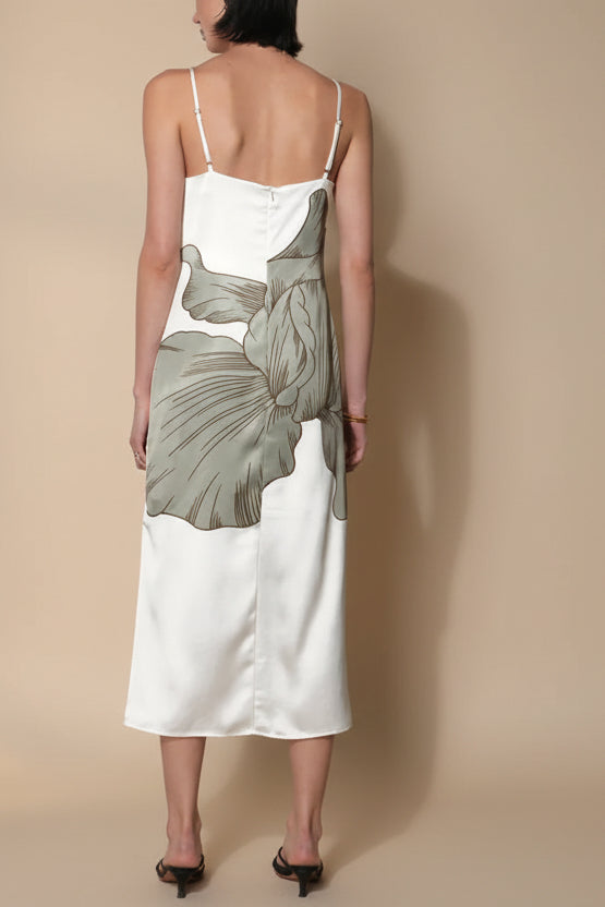 back of a woman wearing Brynlee Ivory Midi Satin Dress with Leaf Motif from Boutique 1861