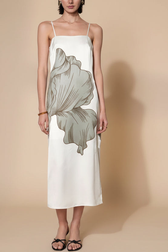 front of a woman wearing Brynlee Ivory Midi Satin Dress with Leaf Motif from Boutique 1861