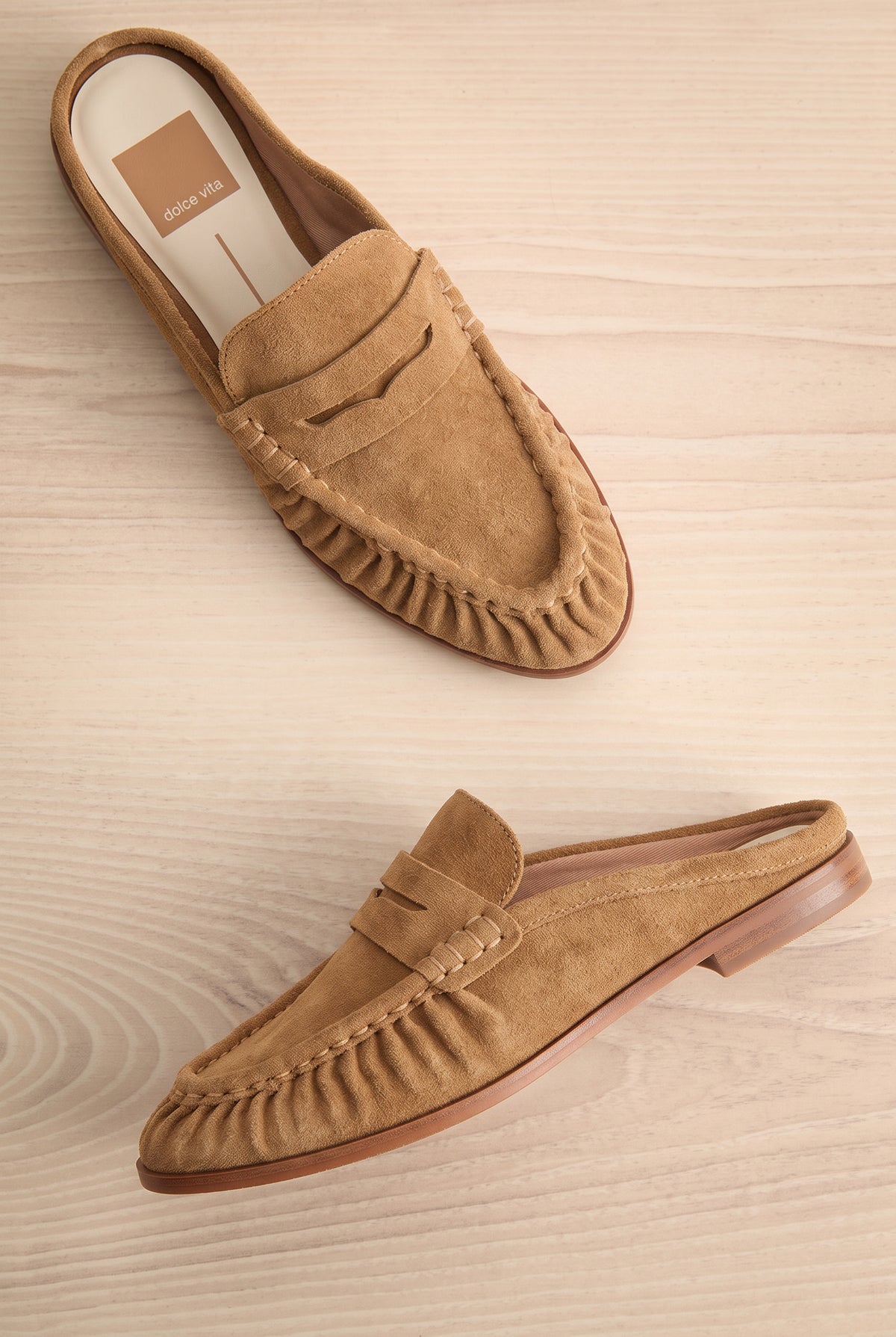 flat lay of Betzy Brown Suede Slip-On Loafers at La petite garçonne