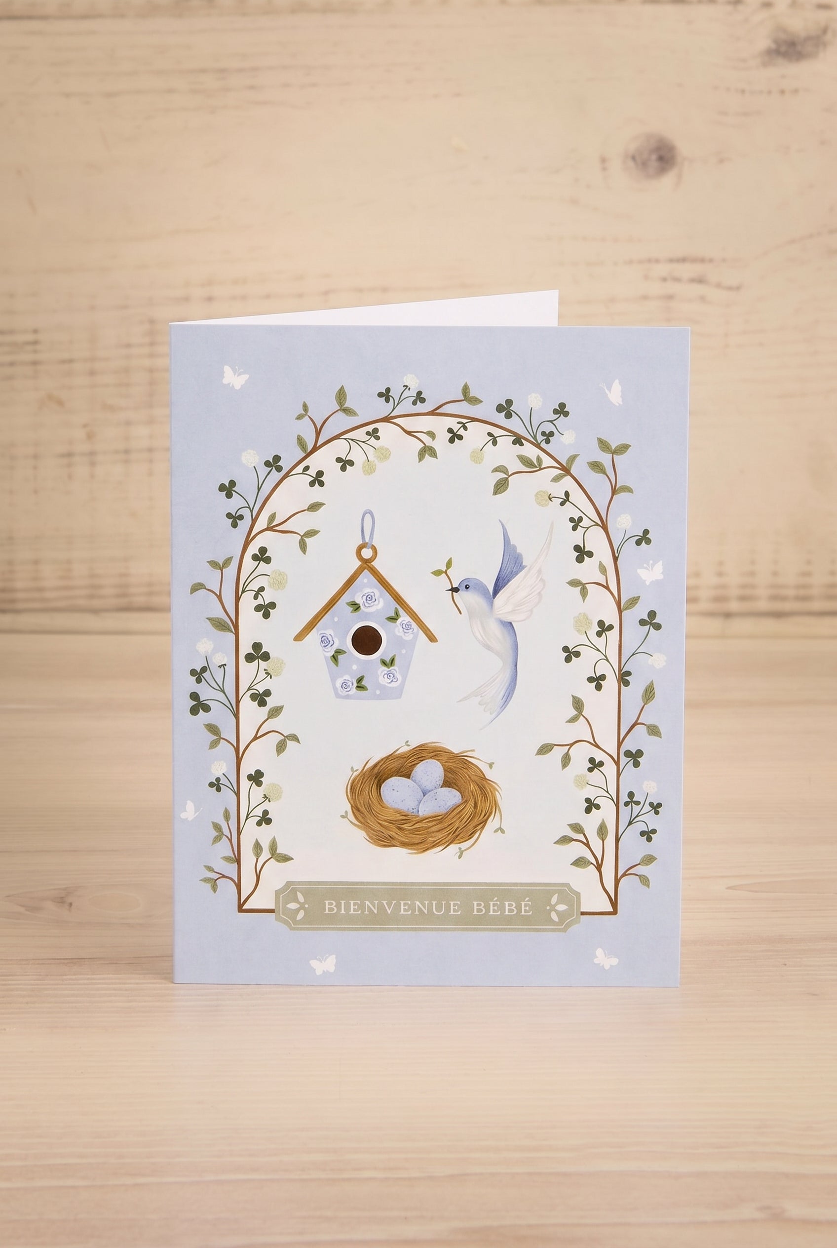 photo of a greeting card at maison garçonne that says bienvenue bébé illustration by Marie-Lise