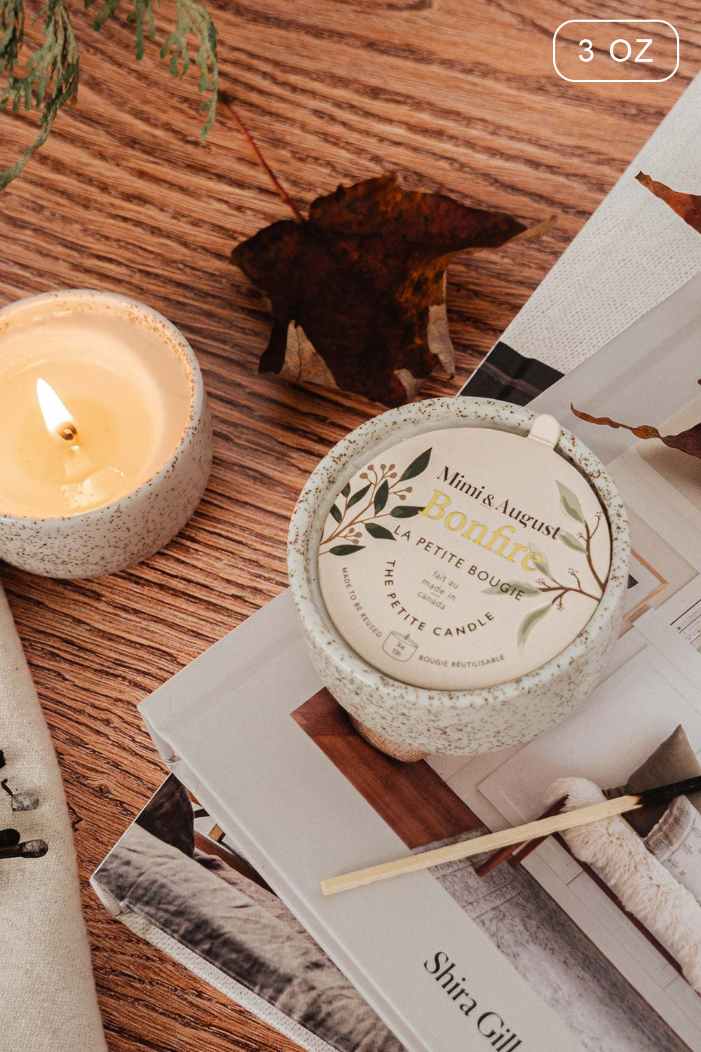 Bonfire 3 0z Reusable Candle with the enchanting scent of cedarwood and smoked vanilla from Mimi & August