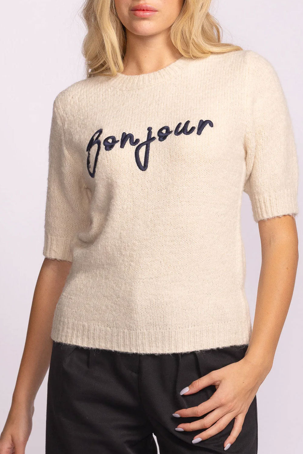 person wearing Radcliffe Embroidered Beige Knit Top from La petite garçonne front