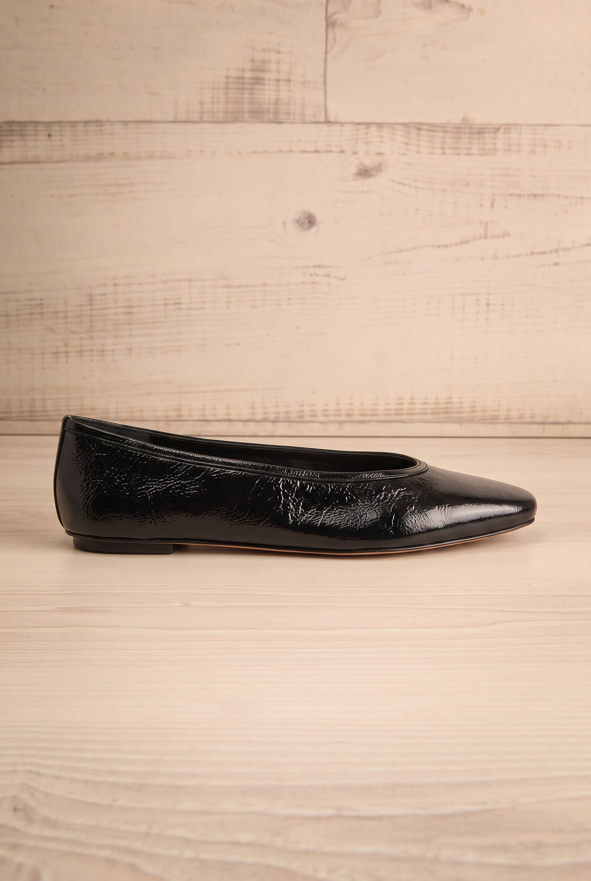 side view of Caret Black Leather Square Toe Ballet Flats at La petite garçonne