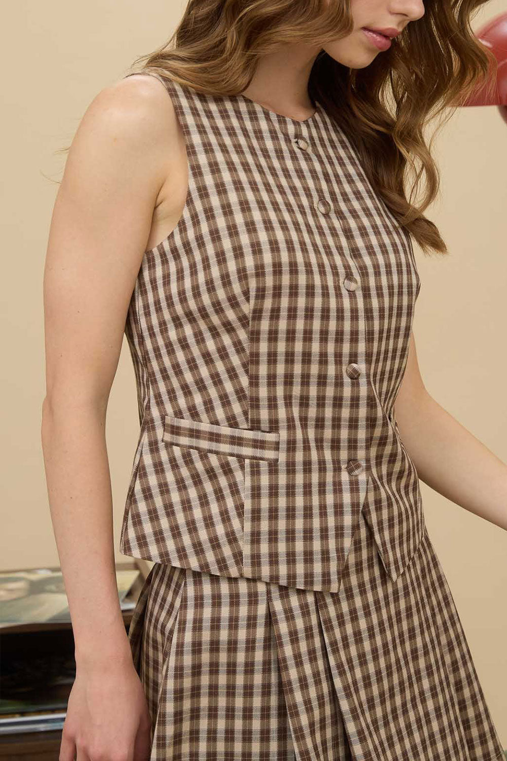 Person wearing Carince Brown Plaid Button Down Vest from La petite garçonne sideview