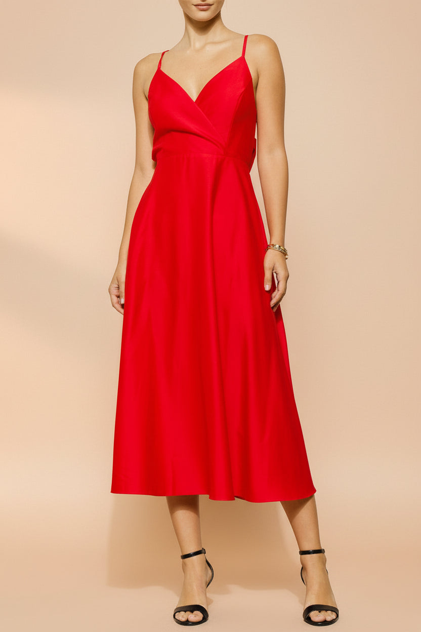 front view of a woman wearing Caryanne Red Tie-Back Satin Dress from Boutique 1861