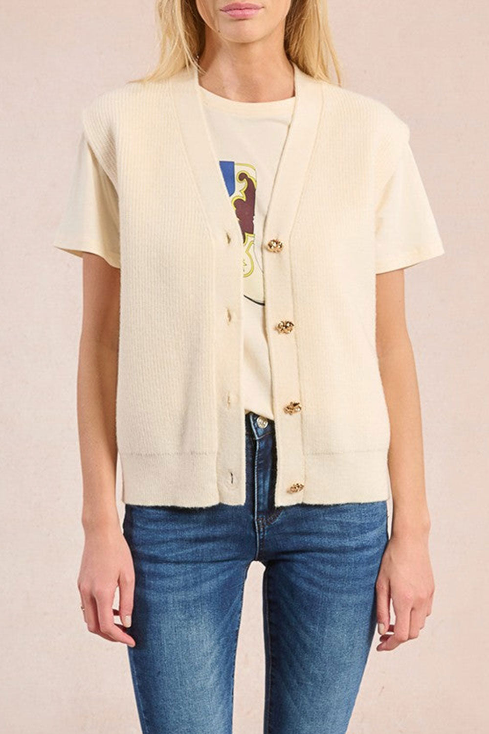 Woman wearing Castelo Ivory Sleeveless Knit Vest from La petite garçonne front view