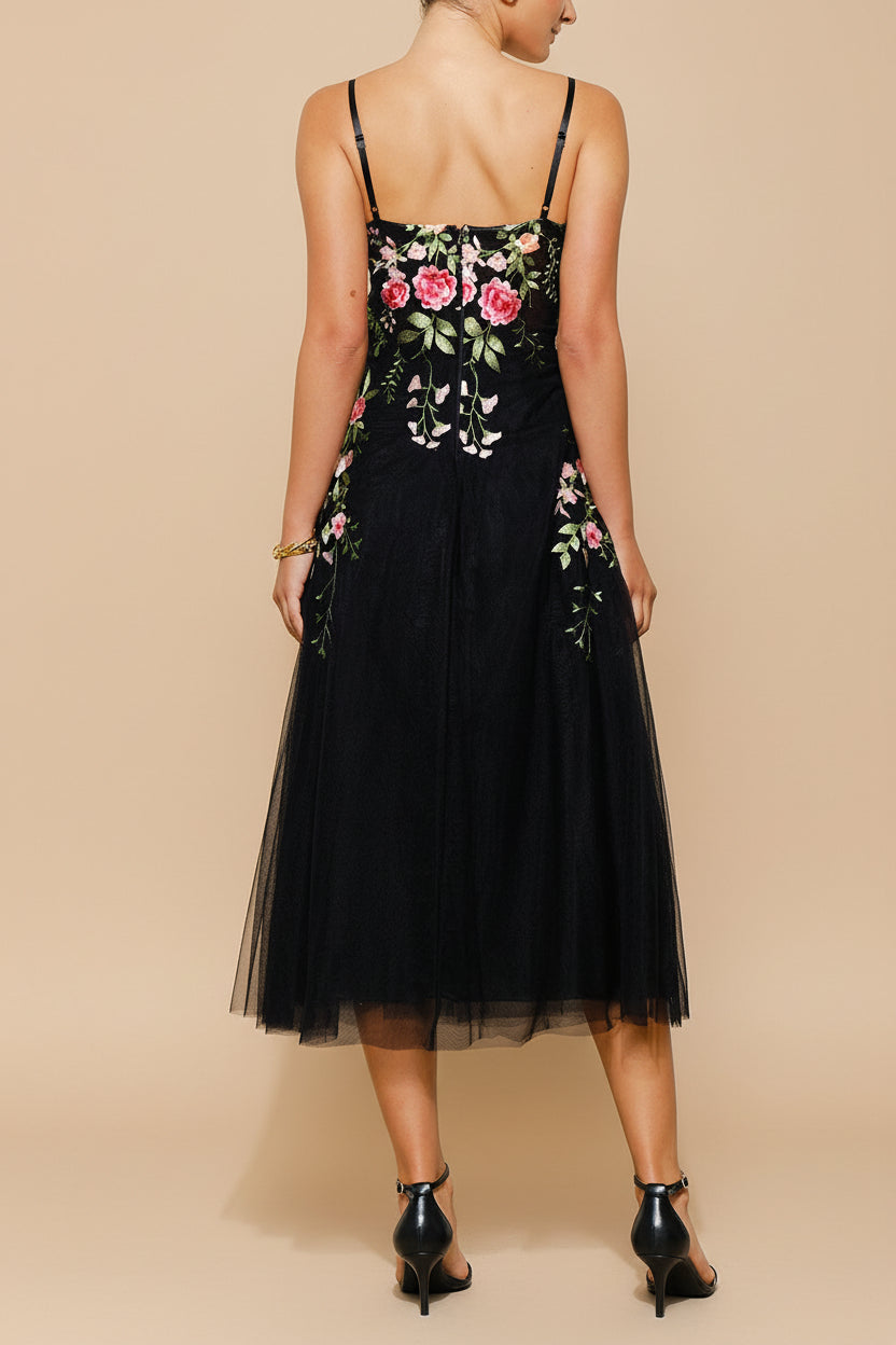 back view of a woman wearing Claree Black Corset Tulle Midi Dress with Floral Embroidery from Boutique 1861
