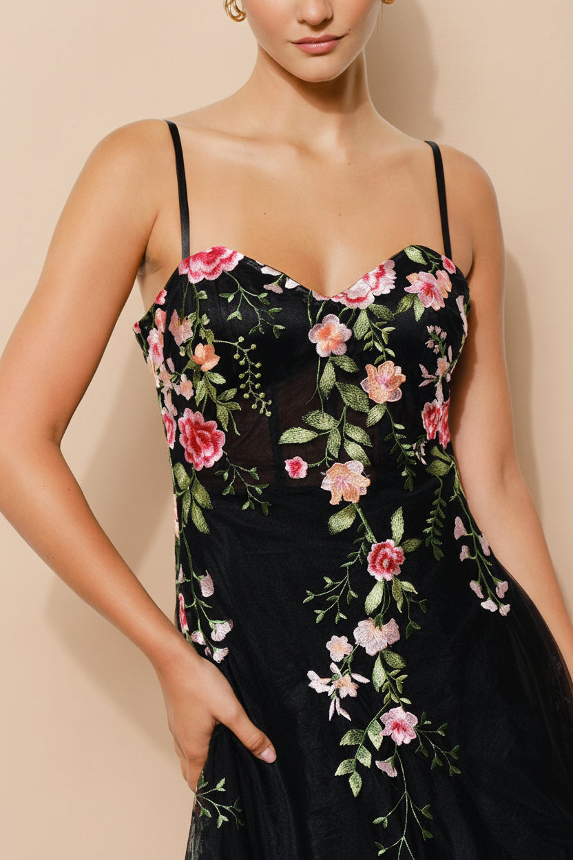 close-up of a woman wearing Claree Black Corset Tulle Midi Dress with Floral Embroidery from Boutique 1861