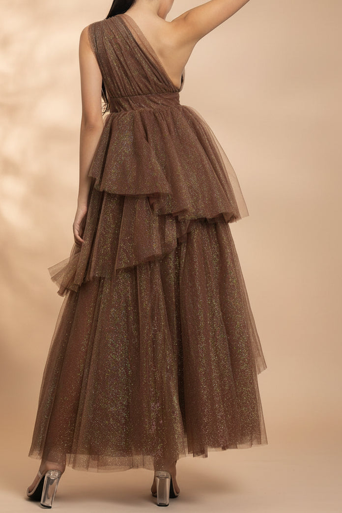 back of a woman wearing Cody Brown Maxi One Shoulder Dress with Glitters from Boutique 1861