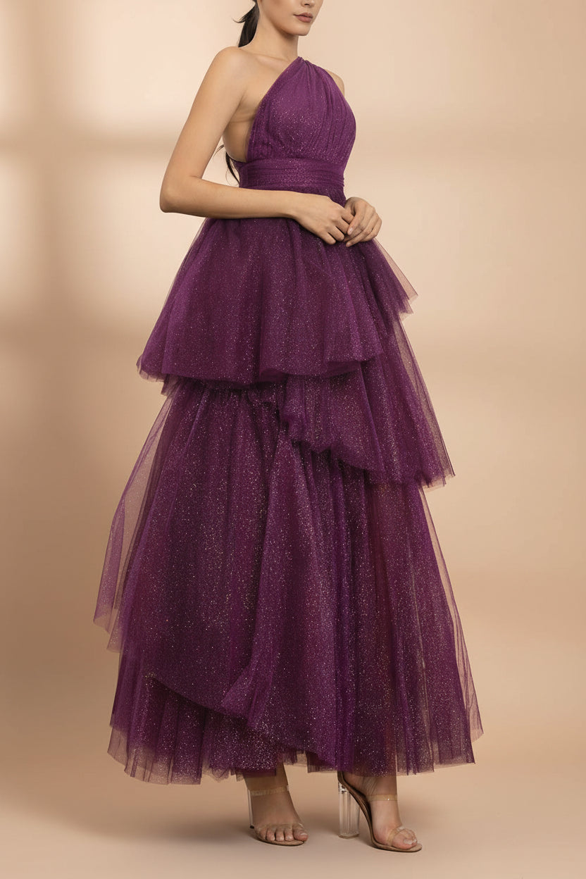 left side of a woman wearing Cody Purple Maxi One Shoulder Dress with Glitters from Boutique 1861