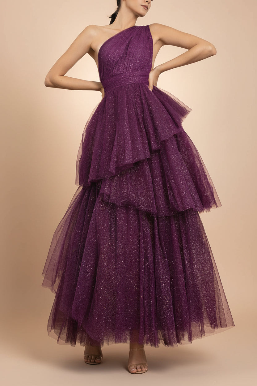 front of a woman wearing Cody Purple Maxi One Shoulder Dress with Glitters from Boutique 1861