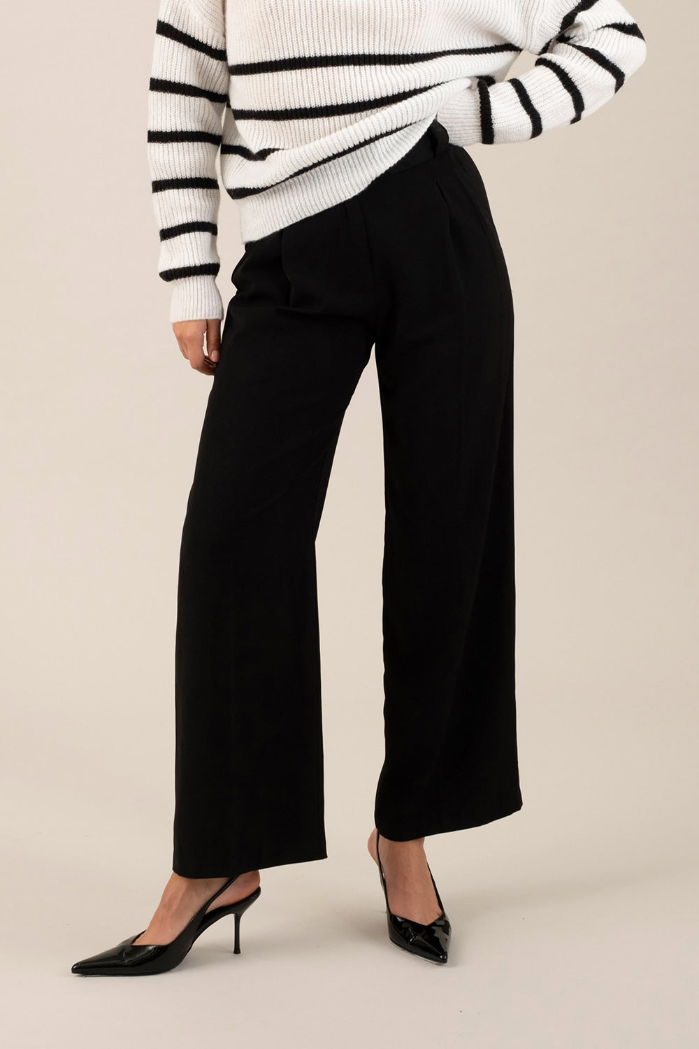 front view of a woman wearing Cortona Black Straight-Leg Pants with Pleats from La petite garçonne