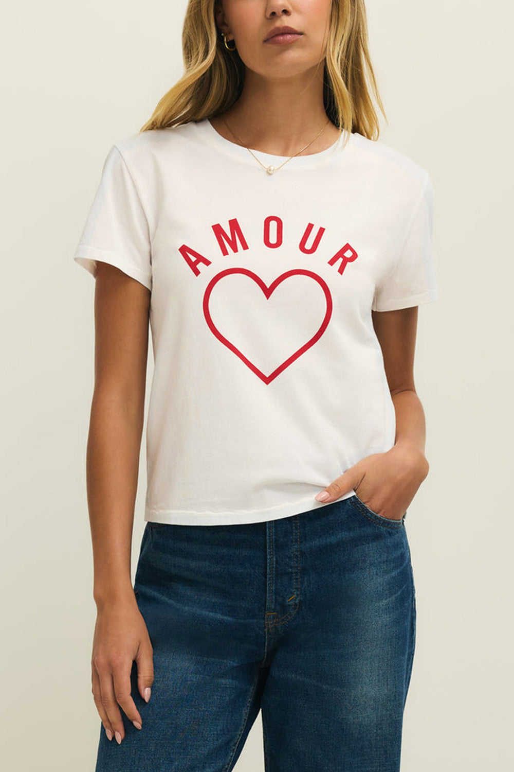 front close-up of a woman wearing Cupids White T-Shirt with Red Heart Motif from La petite garçonne