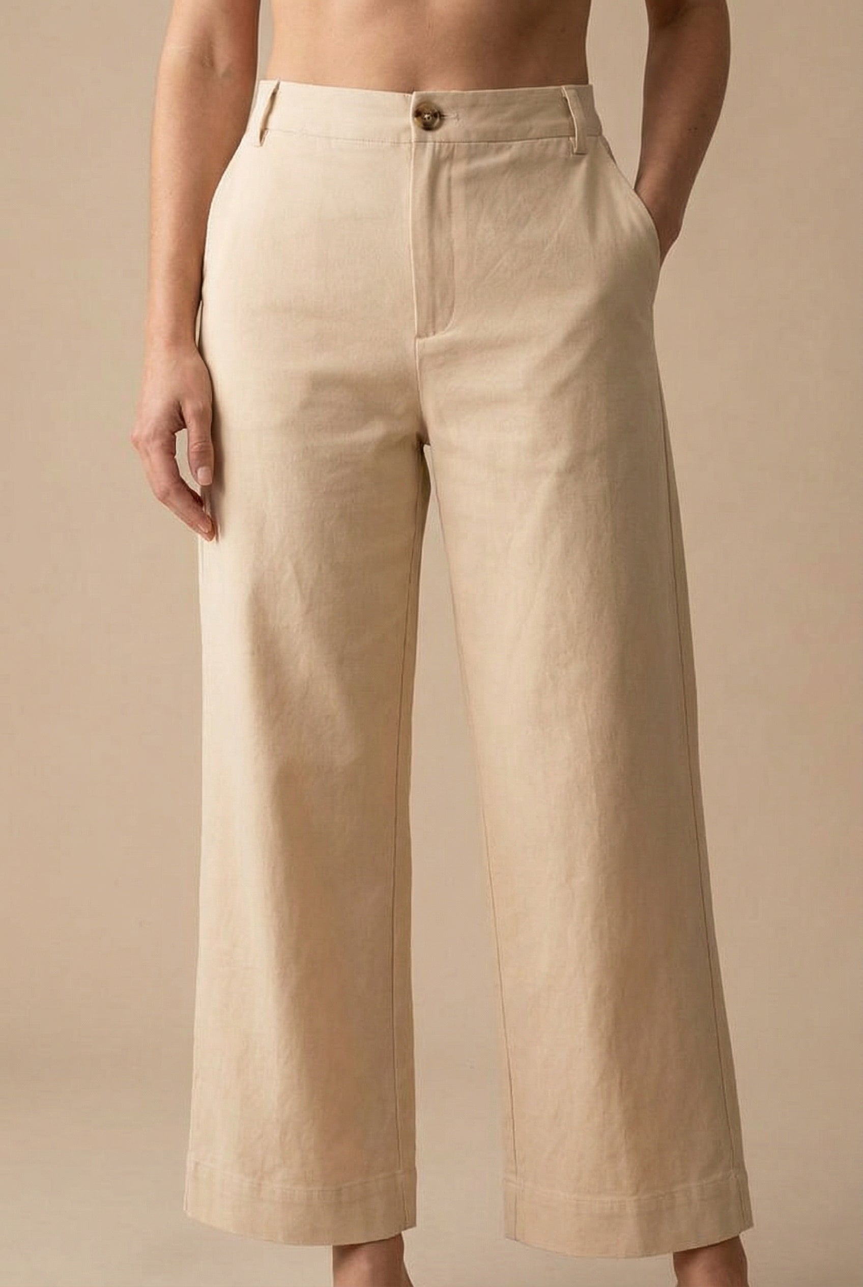 woman wearing Calgary Beige High-Waisted Straight Leg Pants from Boutique 1861