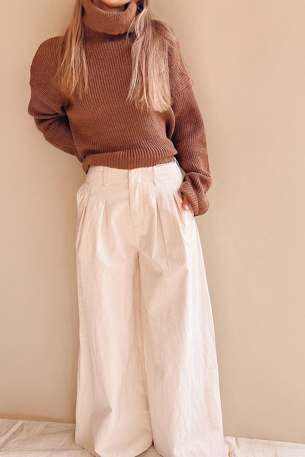 Woman wearing Sauzon Caramel Oversized Turtleneck Sweater with Fringes from La petite garçonne