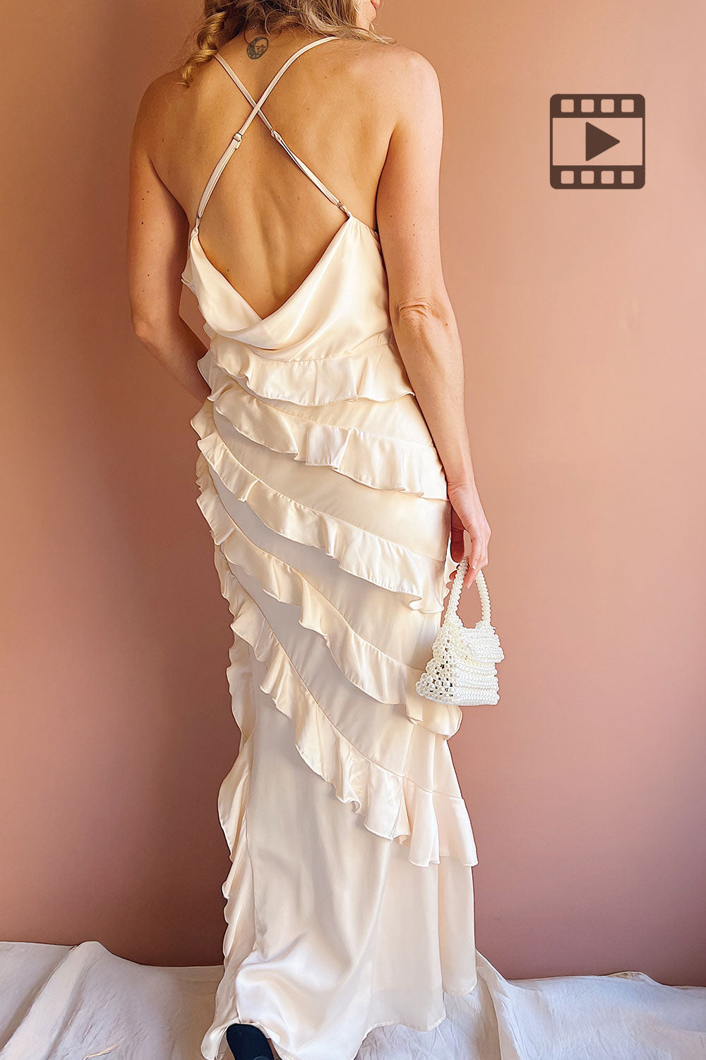 Woman wearing Marieme Beige Satin Dress from Boutique 1861 backview