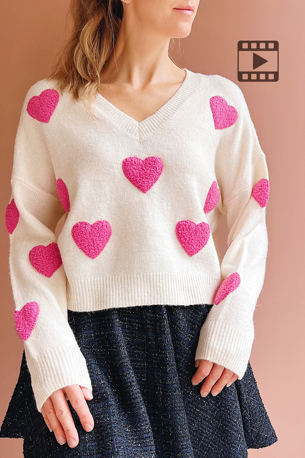 Person wearing Minerve Heart Patterned Knit Sweater from Boutique 1861