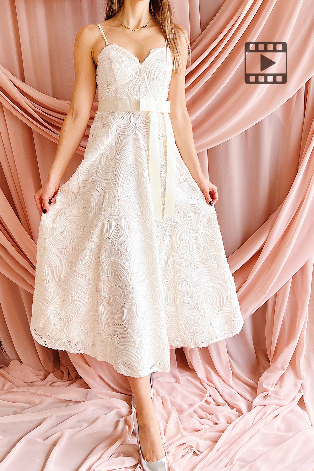 Woman wearing Samarah Midi Ivory Dress with Swirling Textured Pattern from Boudoir 1861