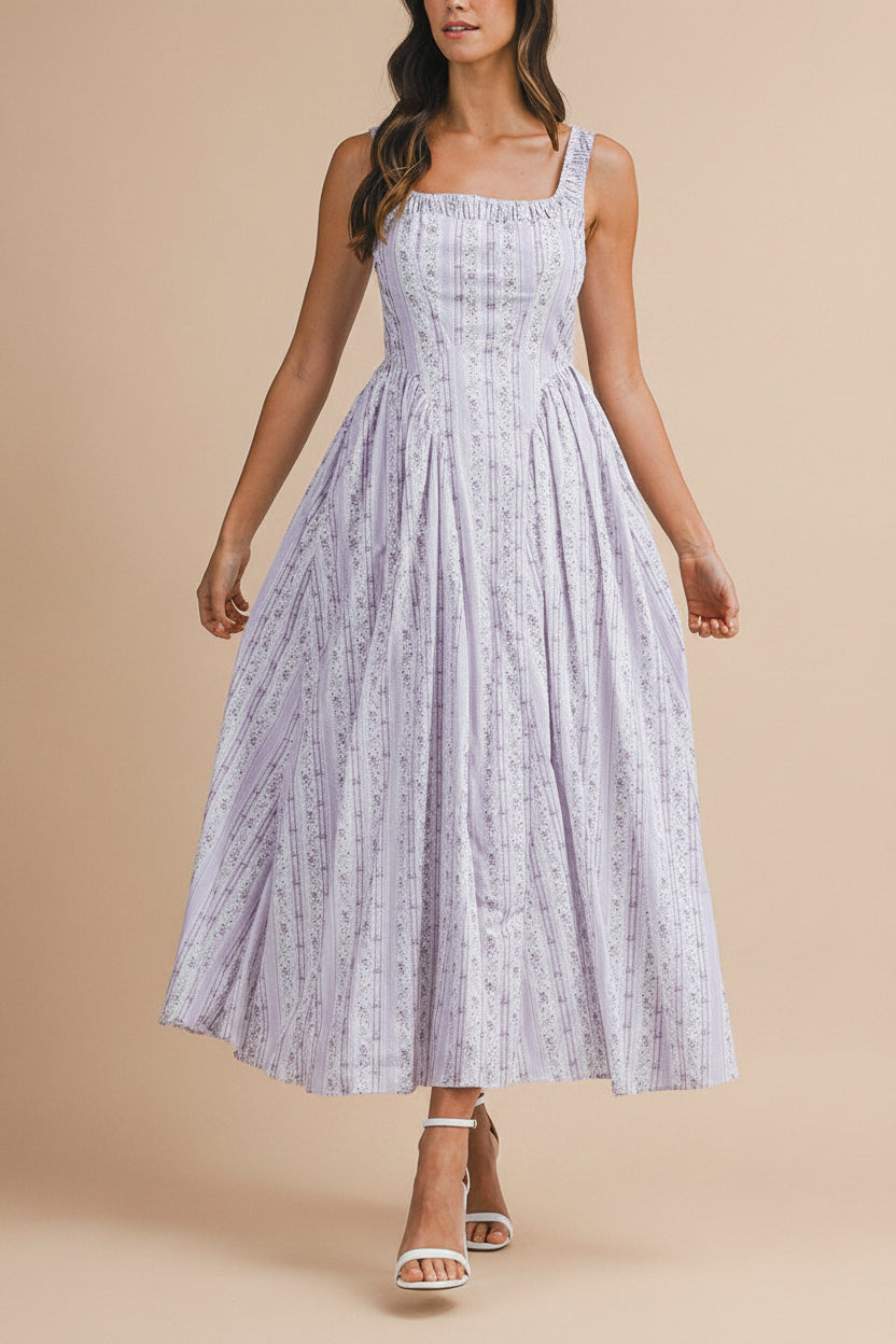 front view of a woman wearing Daiko Lilac Floral A-Line Maxi Dress with Corset Bust from Boutique 1861
