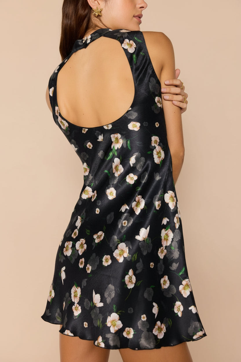 back close-up of women wearing Dalilah Short Floral Dress with Open Back from Boutique 1861