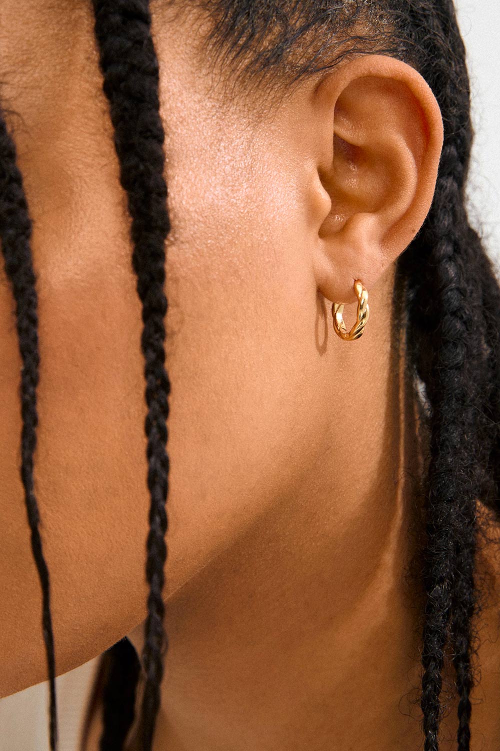 Declan Gold Hoop Earrings with a Twist by Pilgrim | La petite garçonne model