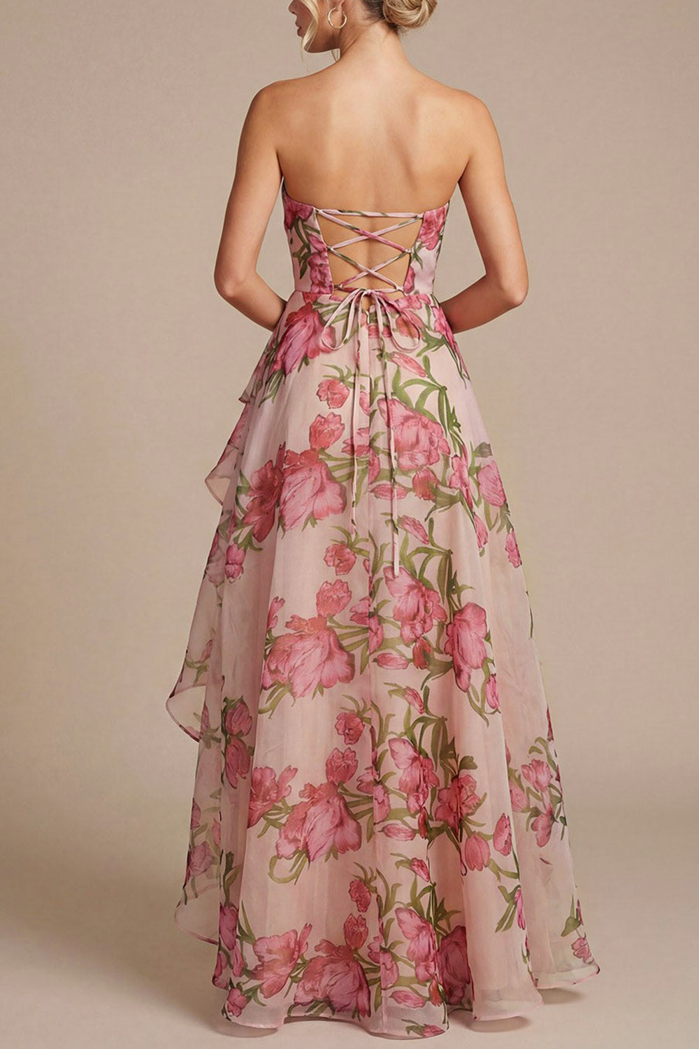 back of a woman wearing Delora Floral Organza Ruffled Maxi Dress with Front Slit and Lace-Up Corset from Boutique 1861