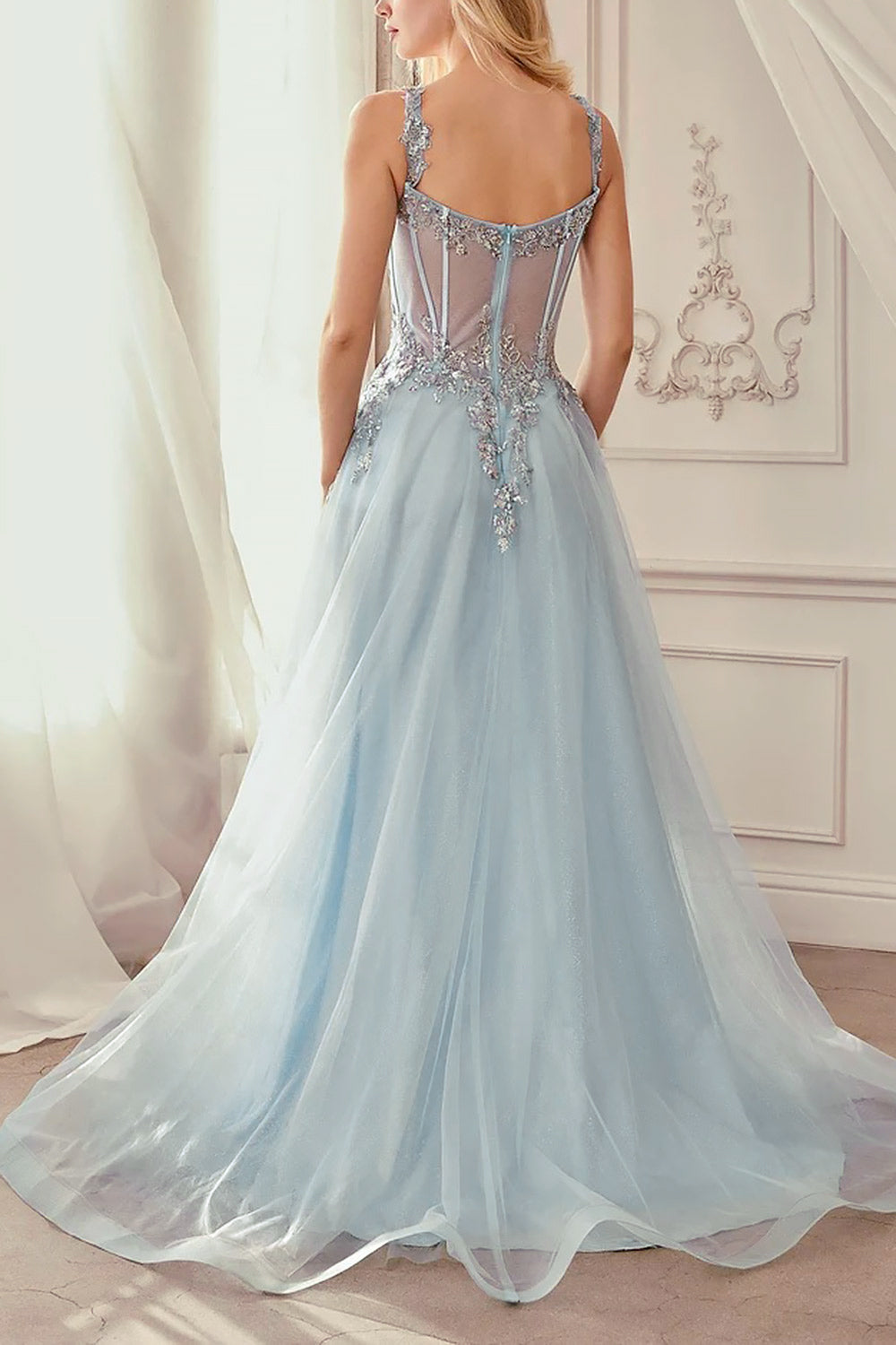 back of a woman wearing Emerie Blue Translucent A-Line Corset Dress from Boutique 1861