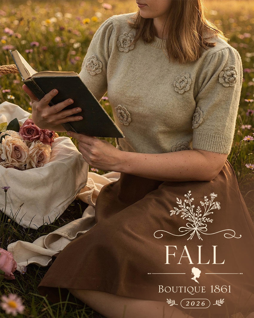 Woman wearing a floral knit sweater and brown skirt for Boutique 1861 Fall 2026