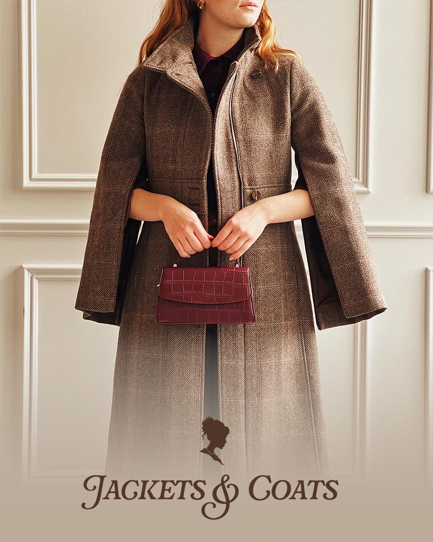 Woman wearing a brown coat and burgundy handbag