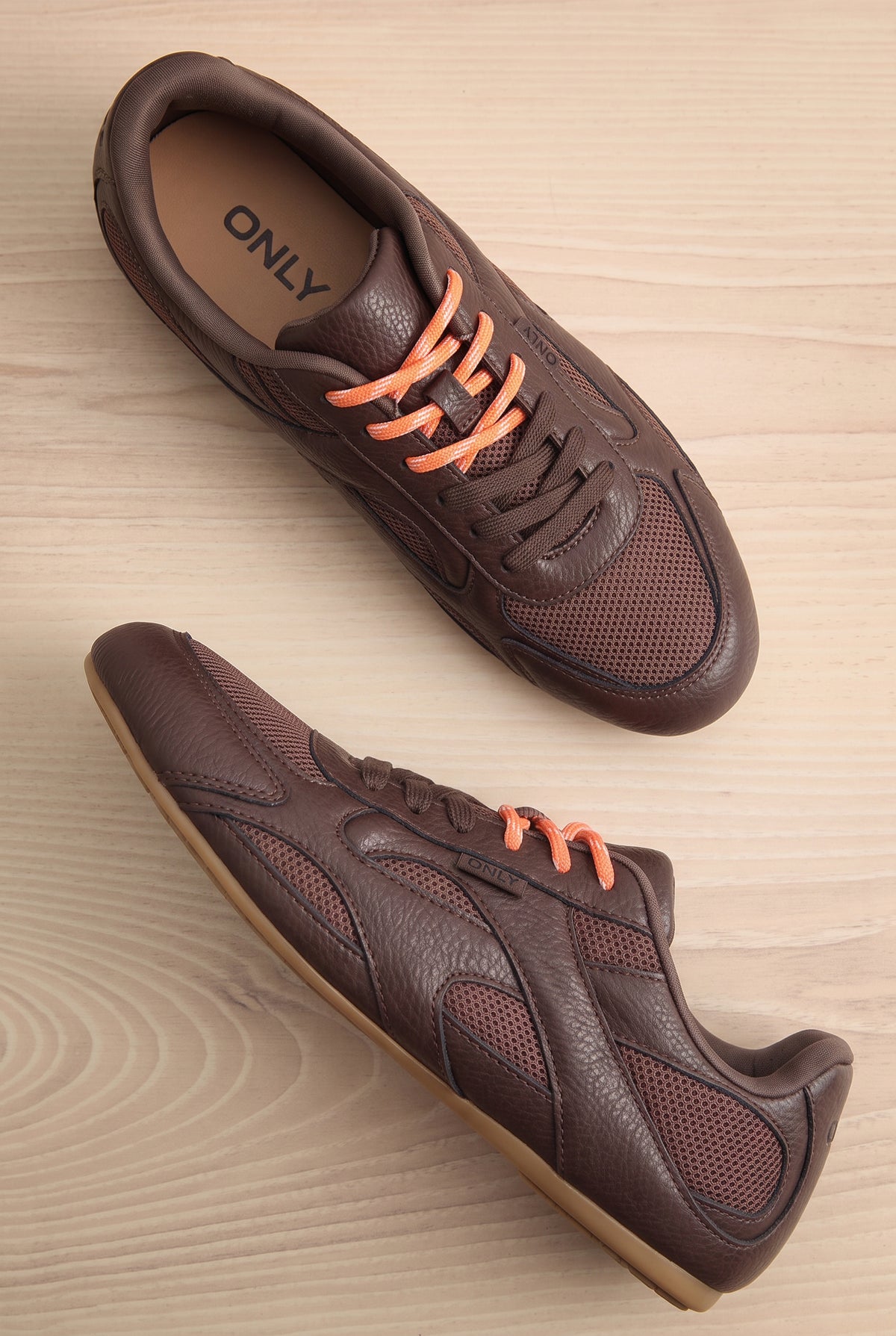 Top view of Edelweiss Brown Lace-Up Sneakers from Only at la petite garçonne wood background in Montreal