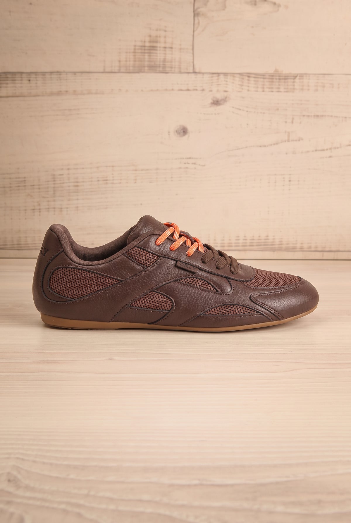 Side view of Edelweiss Brown Lace-Up Sneakers from Only at la petite garçonne wood background in Montreal