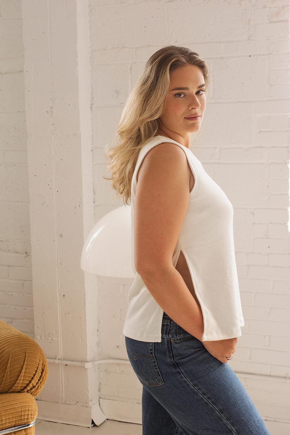 Emmia Ivory Knit Top w/ Side Slits | La petite garçonne on model