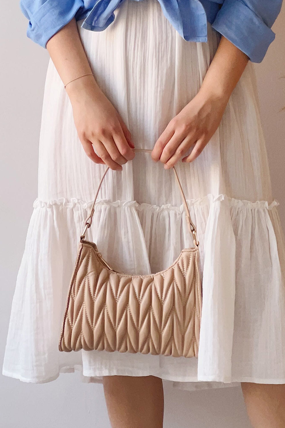 Roseaux Beige Chevron Quilt Shoulder Bag | La petite garçonne on model