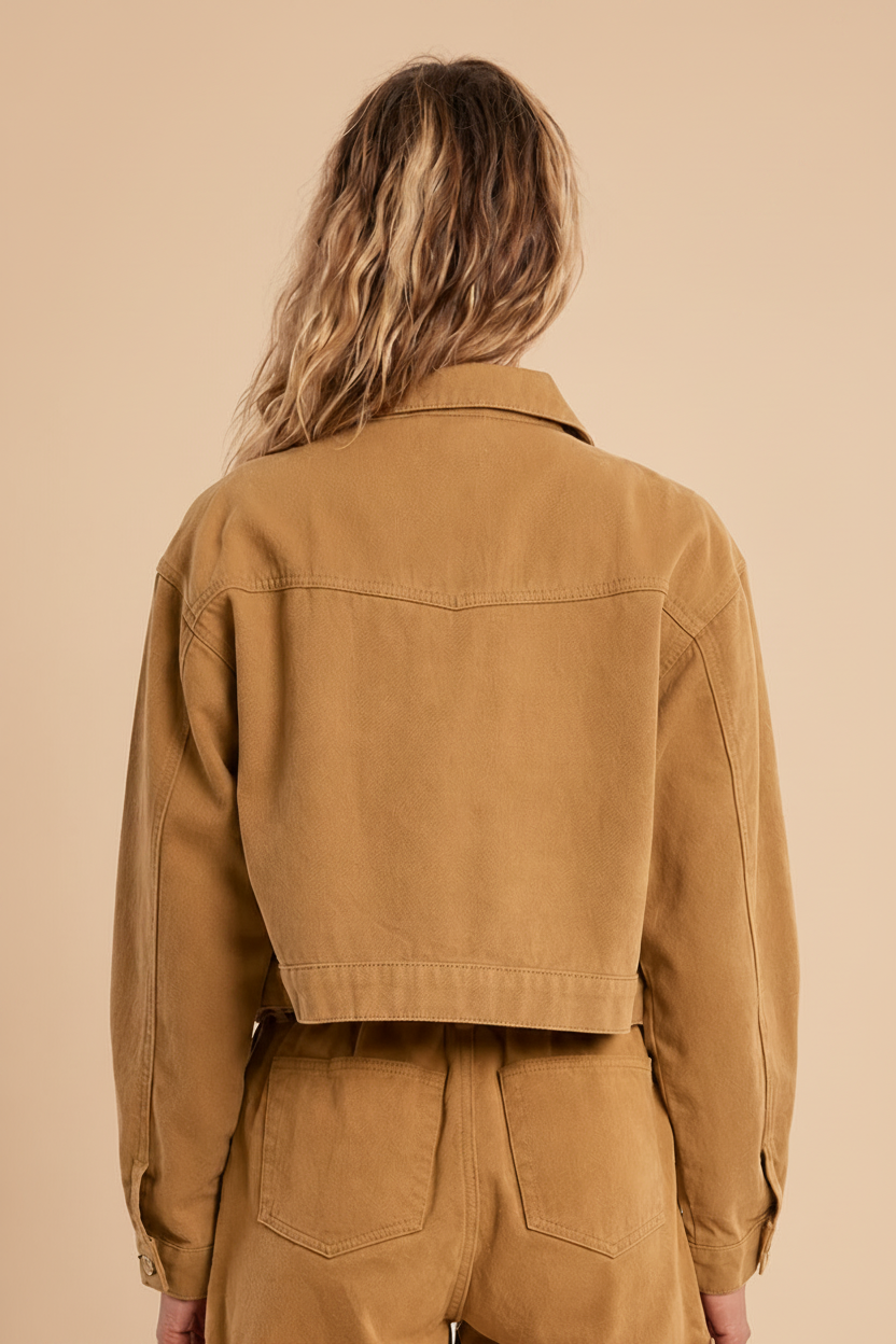 backview woman wearing Godhra Short Caramel Denim Jacket at la petite garçonne