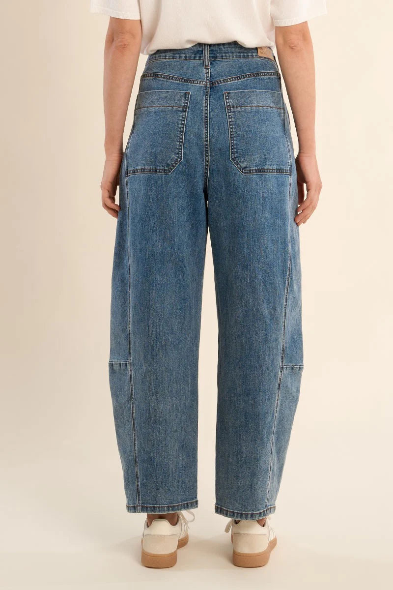 backview woman wearing Hathras Blue Demin Barrel Pants at la petite garçonne