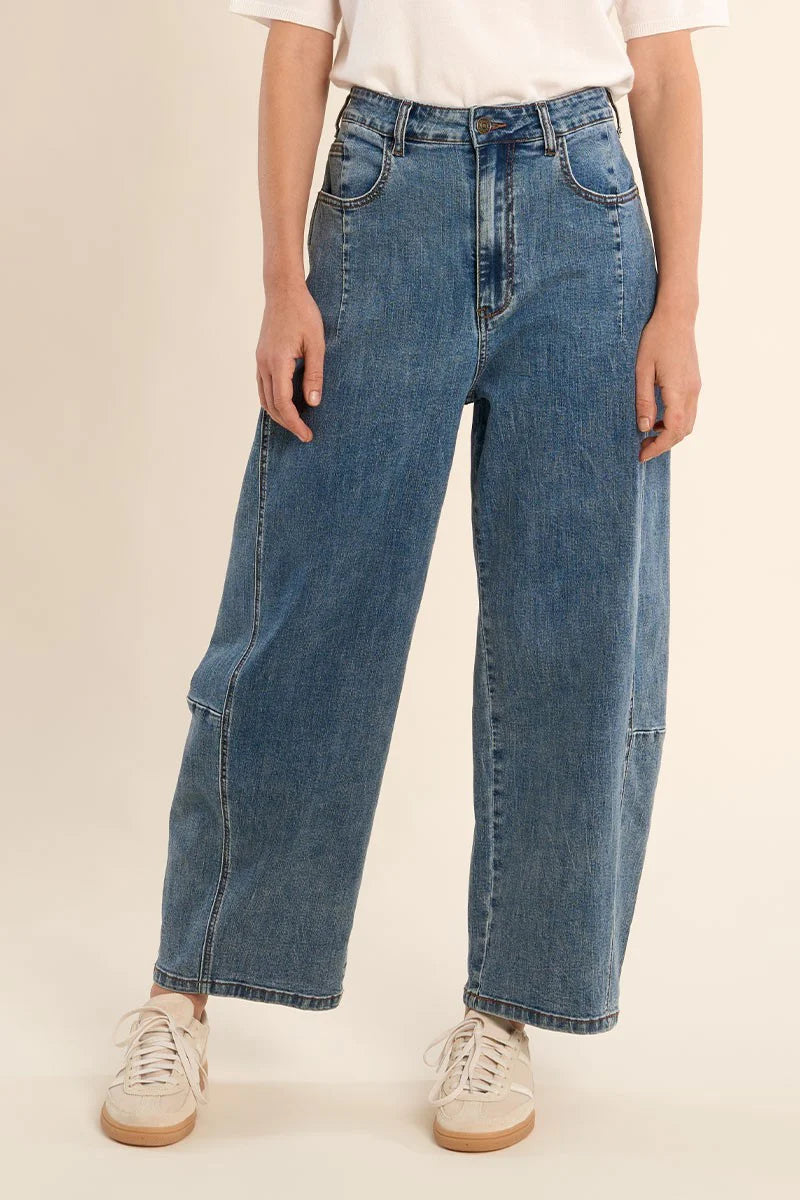 woman wearing Hathras Blue Demin Barrel Pants at la petite garçonne