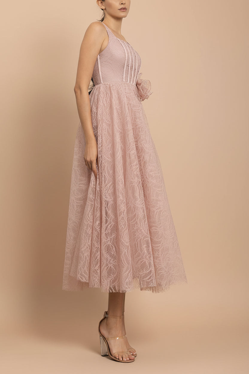 side of a woman wearing Hellis Pink Midi Dress with 3D Flower from Boutique 1861